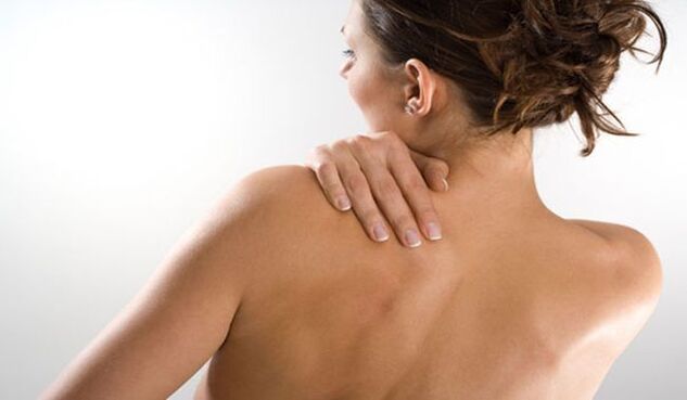A woman is concerned about pain under her left shoulder from behind